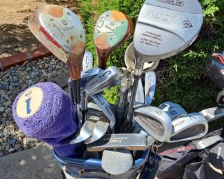 Mixed Set of Golf Clubs and Bags