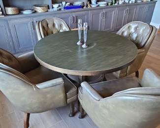 Round Dining Table with Four Tufted Chairs and Leaf