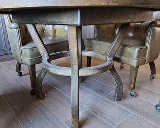 Round Dining Table with Four Tufted Chairs and Leaf