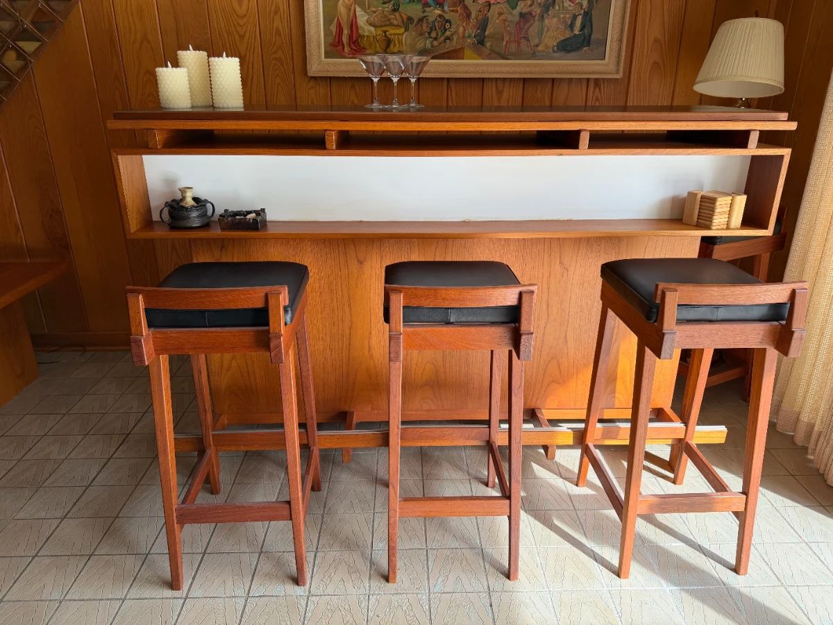 Set of 4 (4th chair behind bar) Erik Buch bar stools and a Dyrlund dry bar