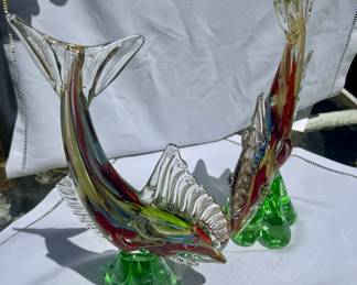 Pair of Vintage iridescent Murano glass fish sculptures on green glass bases