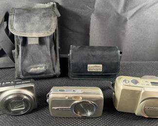 Nikon And Olympus Cameras