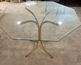 Glass And Gold Colored Table