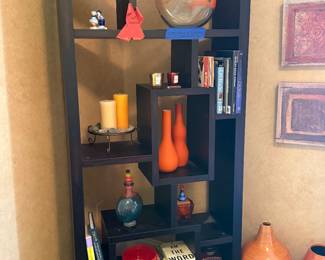 Items on the shelves for sale. Bookcase is not for sale. 