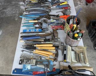 channel locks, hammers, dremels, hand tools, lathe tools