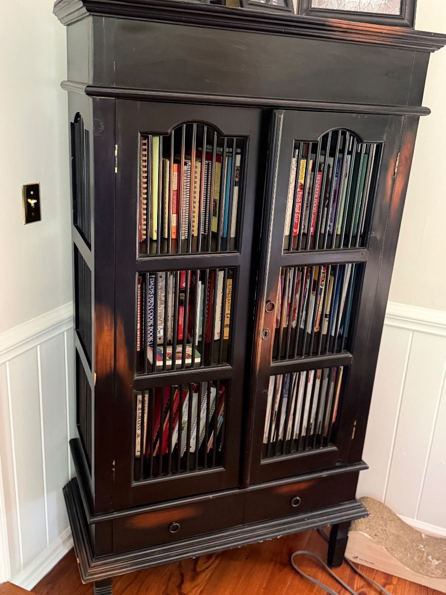 Bookcase with spindled doors and bottom drawers