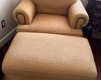 One of two oversized chair with ottoman