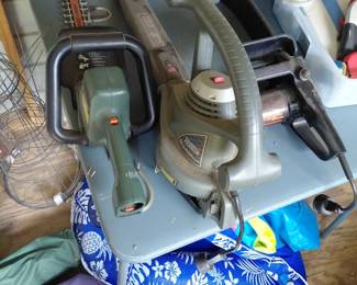 Hedge trimmers, leaf blower and tree chainsaw