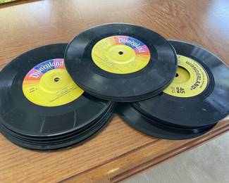 About 20 45’s of mostly Disney