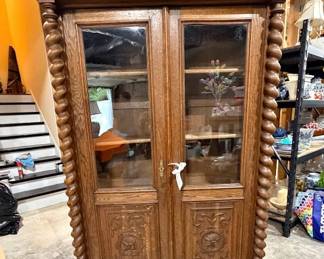 Oak barley twist double door bookcase.
