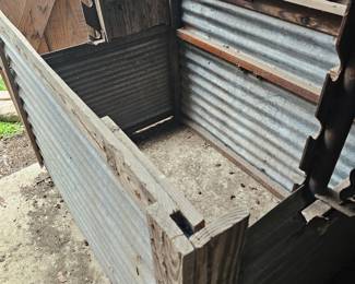 this is a pig roaster, with rods( we have them too) it would make the perfect cooking tool