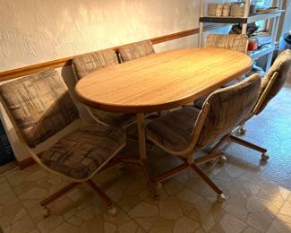 Dinette Set-Oval Table 36” x 60” with 6 Flexible Back Rolling Chairs 