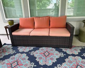 Wicker Outdoor Sofa with Coral Cushions