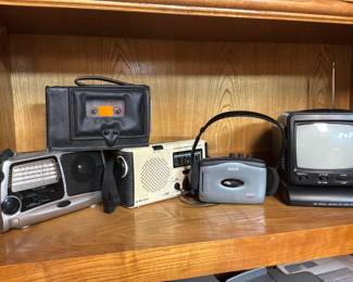 Crank rechargeable AM/FM radio/mini personal TV set vintage Sony cassette portable player