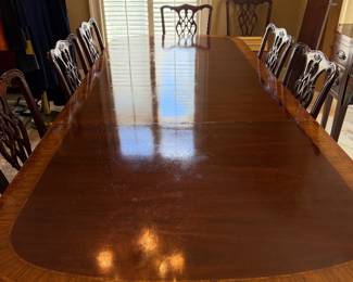 This is a banquet style dining table 72 inches with 3 leaves for a total of 10 ft 