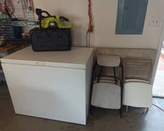 Freezer, chainsaw and vintage folding chairs