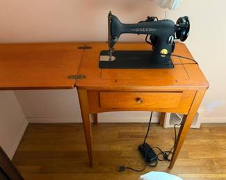 Vintage singer sewing machine with cabinet and attachments