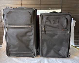 cl Tumi Black Suitcases