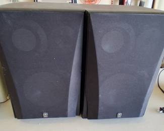 pair of black Yamaha NS-6490 3-way bookshelf stereo speakers