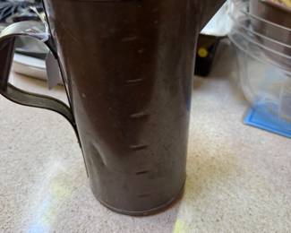 large copper pitcher