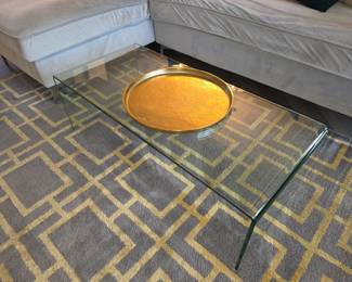 Waterfall style glass coffee table