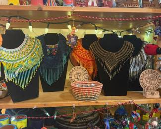 Beaded jewelry and clay, hand painted animsls