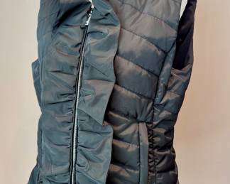 ($28- Black White ruffled vest- size L)