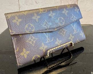 ($140- vintage Louis Vuitton  wallet)