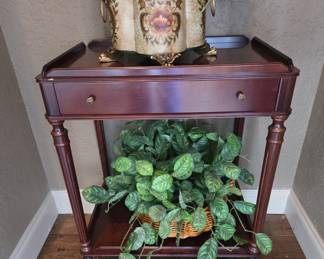 Mahogany finish rolling side table, florals