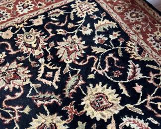 Black/gold/reds rug 5x8