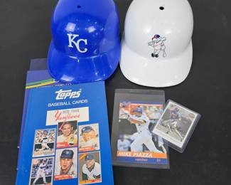 Lot #B75 - Baseball Card Guides, Mike Piazza & Paul Molitor Signed Baseball Cards, Denver Bears & Kansas City Royals Helmets
