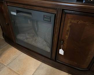 Inlaid mahogany shaped front Console with electric fireplace (never used)