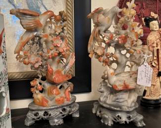 Pair of large & finely carved and colored soapstone bird & flower groups