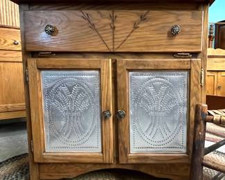 Cabinet with punched tin doors