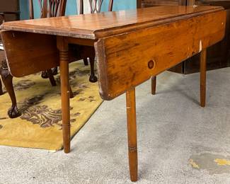 Long wooden drop leaf table