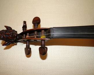 Close Up of Figural Carving on Pegbox of Violin Believed to Be Early 1800's German