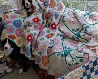Vintage handmade AMERICAN quilts.  Patchwork has matching crib quilt to left.  Large pink flower applique.  Blue & white has one hole.