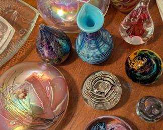 Sample of late 20th century studio art glass collection of paperweights and oil lamps.  