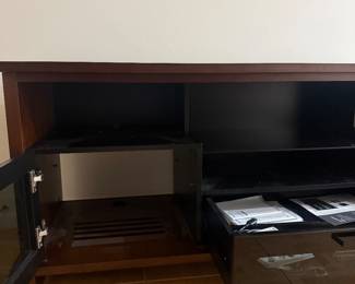 BDI High-End TV Console / Entertainment Center – Like New...   Premium BDI high-performance media console in excellent, like-new condition.  Dimensions: 68.5” W × 20.5” D × 27” H  Finished in brown with cabinets and drawers designed for full entertainment systems.  Features: • Built-in cable management • Ventilated storage for electronics • Adjustable shelving • High-quality, modern design  BDI is known for top-tier construction and functionality—this is not a basic TV stand.  No scratches or damage. Very well maintained.  