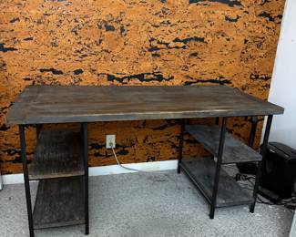 Modern industrial-style desk or console table in great condition.  Dimensions: 48” L × 28” D × 35” H  Features: • Wood top with black metal frame • Built-in shelving on both sides for storage • Sturdy and versatile design  Perfect as a desk, entry table, or bar/serving console.  clean and well maintained.