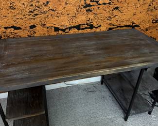 Modern industrial-style desk or console table in great condition.  Dimensions: 48” L × 28” D × 35” H  Features: • Wood top with black metal frame • Built-in shelving on both sides for storage • Sturdy and versatile design  Perfect as a desk, entry table, or bar/serving console.  clean and well maintained.