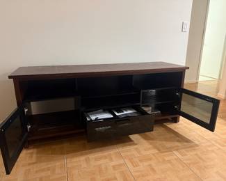 BDI High-End TV Console / Entertainment Center – Like New...   Premium BDI high-performance media console in excellent, like-new condition.  Dimensions: 68.5” W × 20.5” D × 27” H  Finished in brown with cabinets and drawers designed for full entertainment systems.  Features: • Built-in cable management • Ventilated storage for electronics • Adjustable shelving • High-quality, modern design  BDI is known for top-tier construction and functionality—this is not a basic TV stand.  No scratches or damage. Very well maintained.  