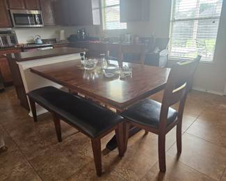 inviting dining room set with chairs and bench