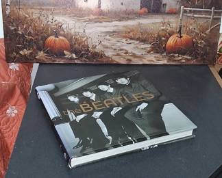 hardcover book titled Images of the Beatles, compiled by Tim Hill and published by Parragon.