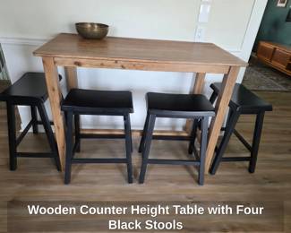 Wooden Counter Height Table with Four Black Stools