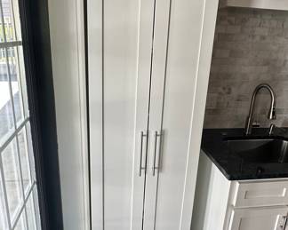 White Tall Two-Door Storage Cabinet