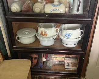 . . . barrister bookcase with great collection of bed pans and bed warmers