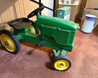 . . . vintage John Deere pedal tractor