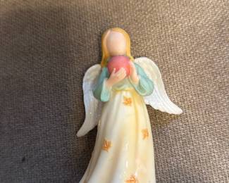Angel Figurine with Red Globe