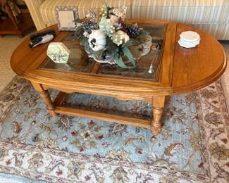. . . oak and glass coffee table and area rug